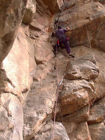 Climbing among the red formations