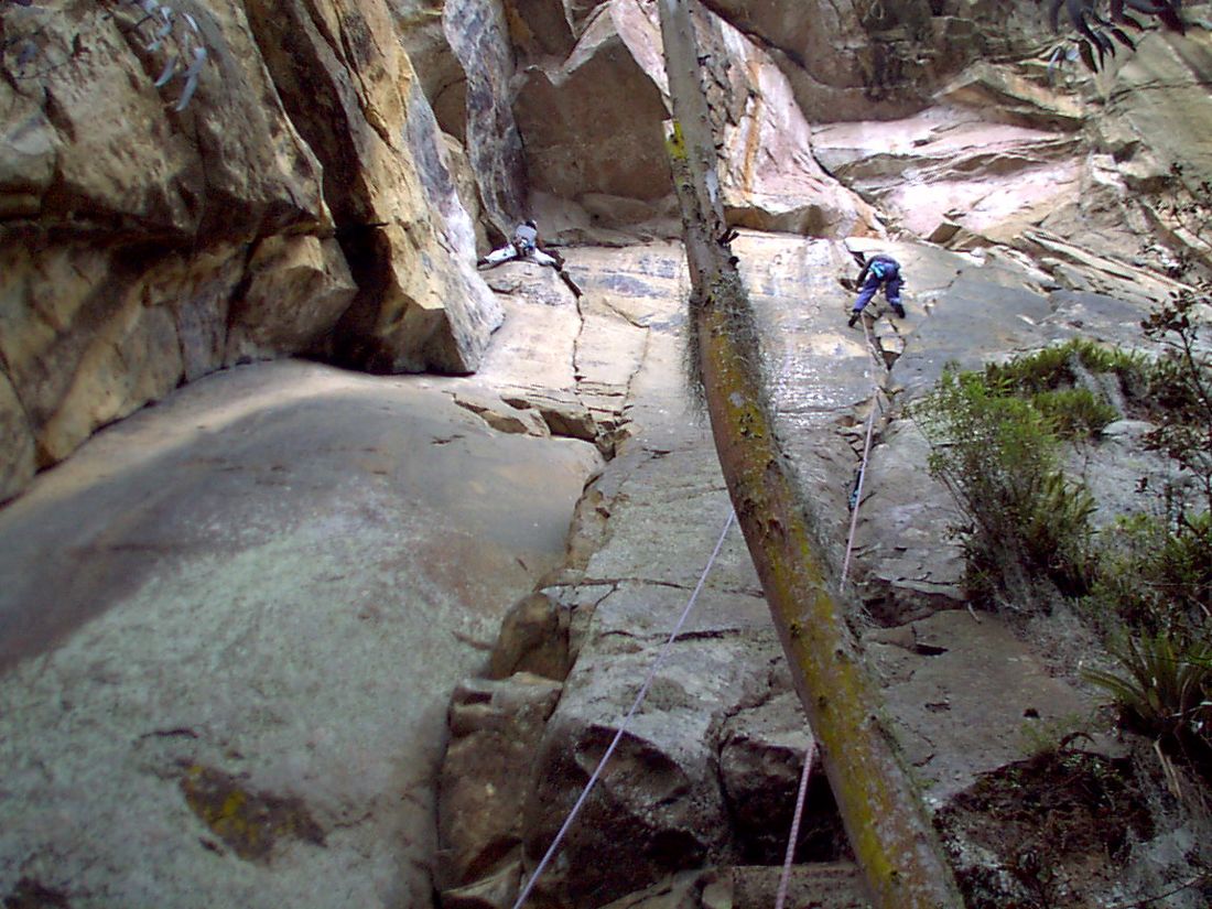 Climbers on the sandstone slabs of the Rocas de Suesca