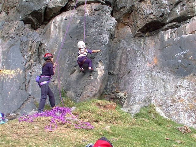 Two climbers on the grey wall
