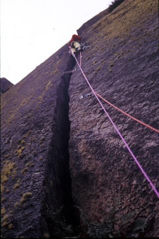 Dihedral with rope on high mountain rock