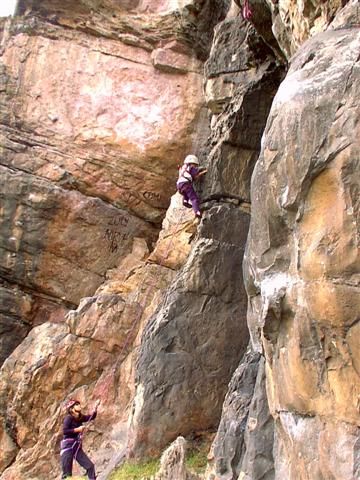 Two climbers on the orange wall