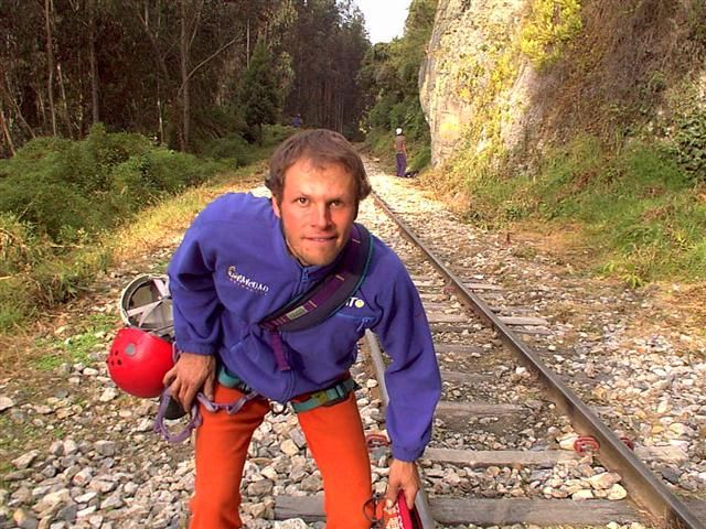Climber with his helmet by the railway line in Suesca