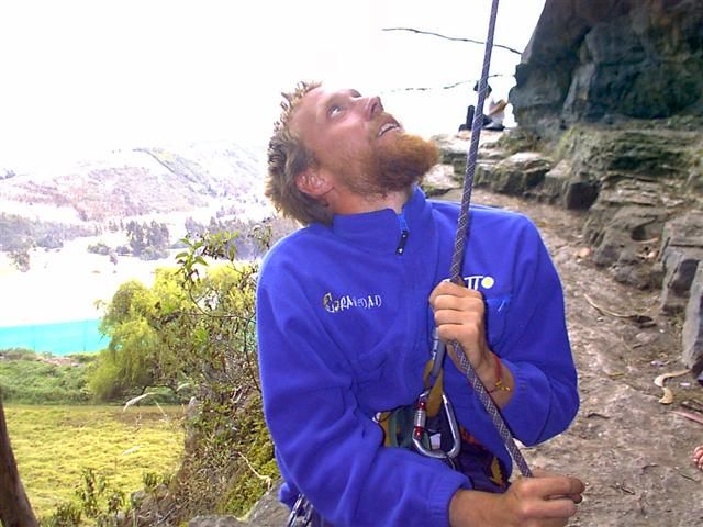 Belaying, eyes on his partner